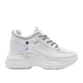 Vita sneakers på en tjock Johansula