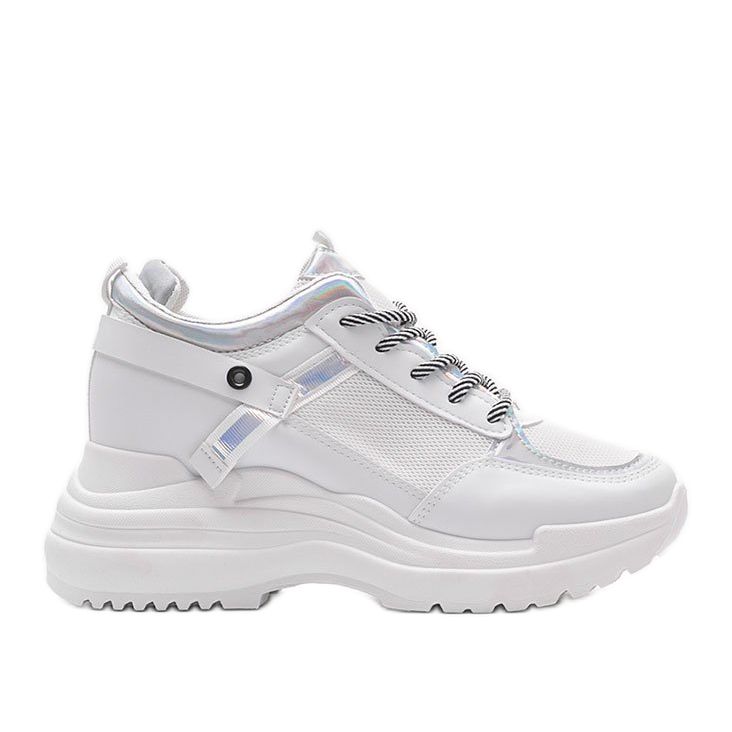 Vita sneakers på en tjock Johansula