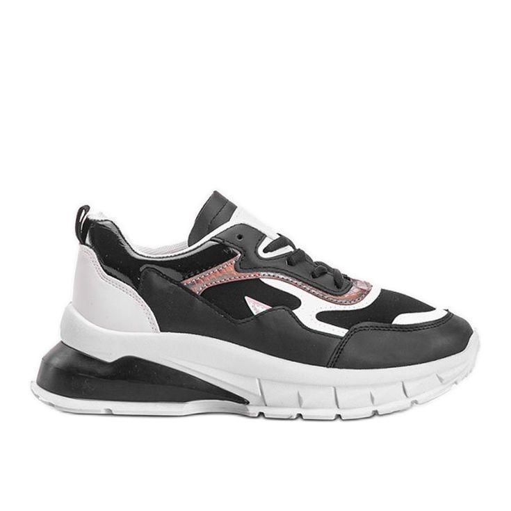 Svarta sneakers med tjock Kristen -sula