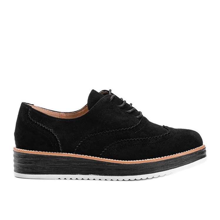 Svarta mockaskor på en hög Kenya -sula