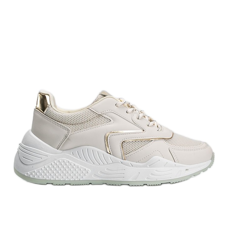 Beige sneakers med en tjock sula med metalliska Kenna -detaljer