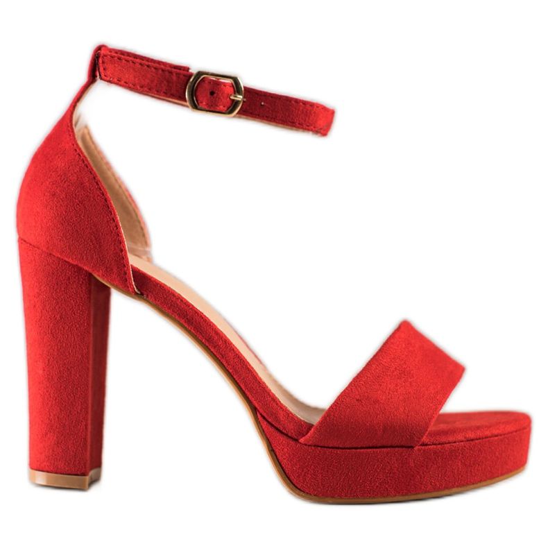 Weide Röda sandaler på en bar