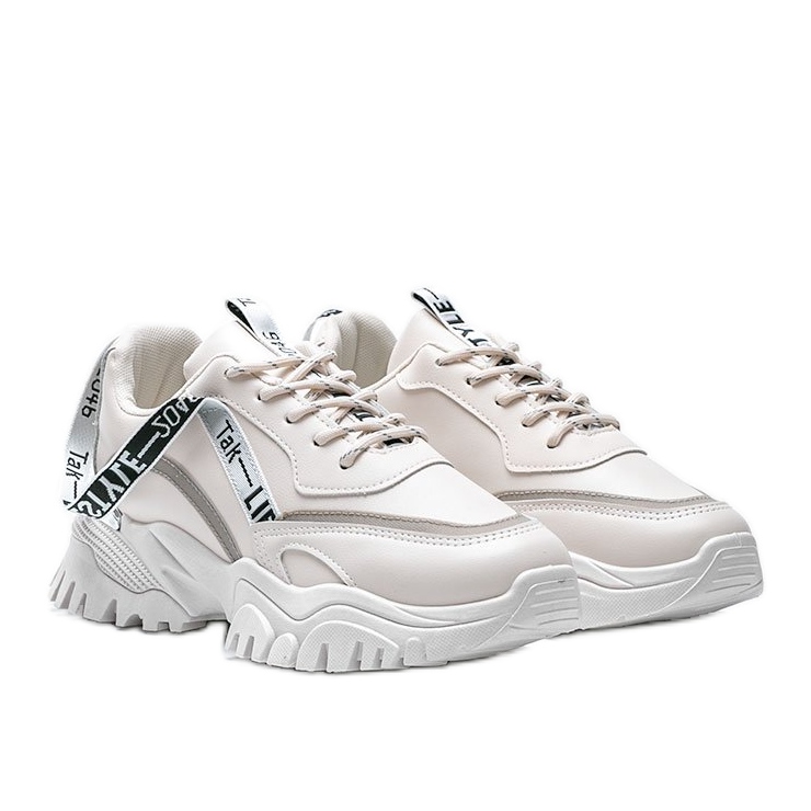 Beige sneakers med tjock Claudia -sula