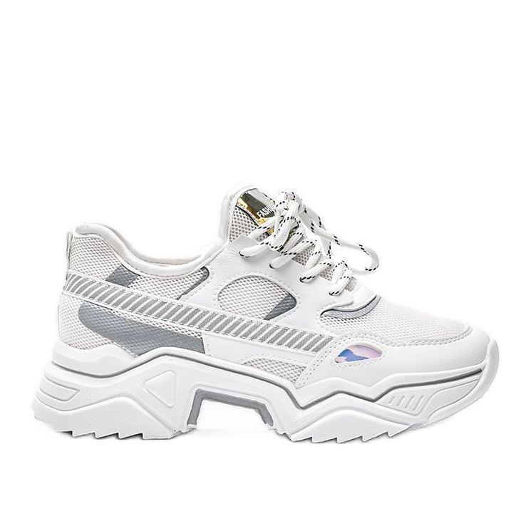 Vita sneakers på en tjock Leanna -sula