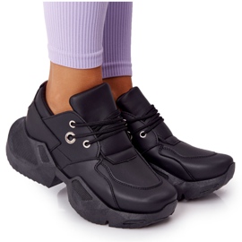 PS1 Damskor på en massiv svart bubblande sula