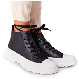 Kvinnors svarta Trissy -läder -sneakers på stor sula