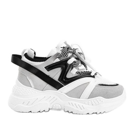 Grå sneakers på en tjock Aracela -sula