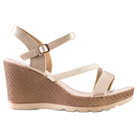 Sabatina Gyllene sandaler på kilen