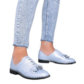 Blå blanka skor med en Lost Stars -rosett