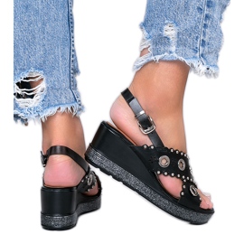 Svart metallic kil sandaler Mån