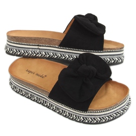 Svarta 7705 Svarta tofflor på den dekorerade sulan