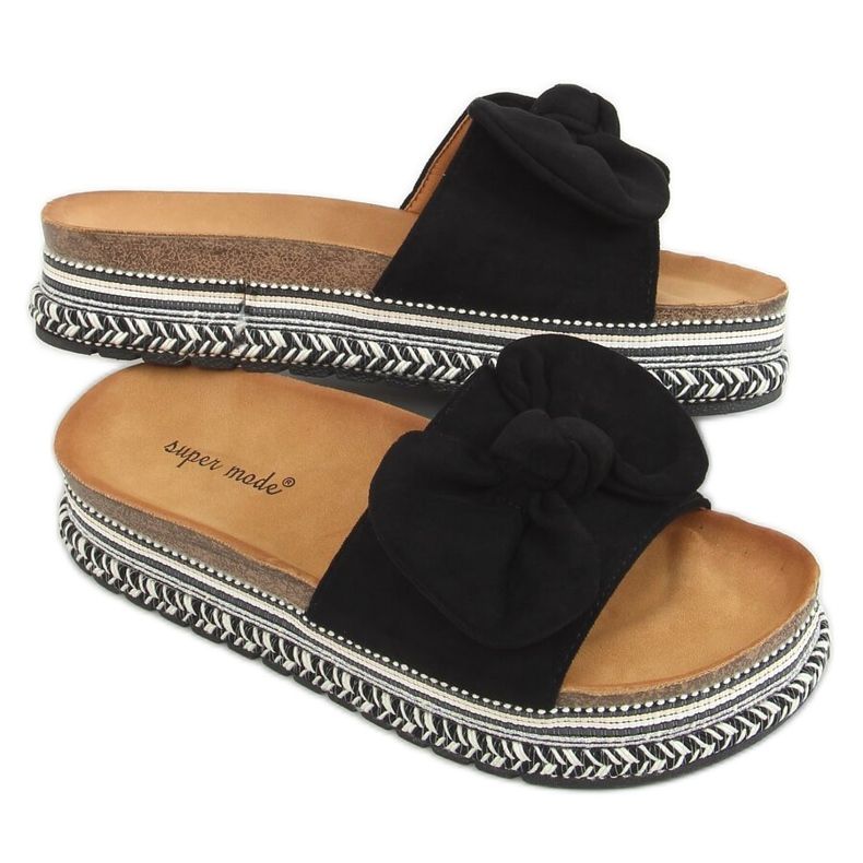 Svarta 7705 Svarta tofflor på den dekorerade sulan