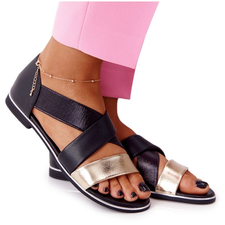 Guld och svarta ribbade sandaler