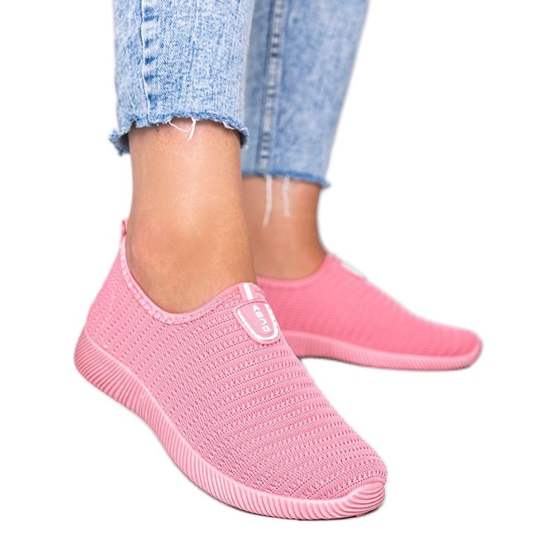 Rosa sportskor "Gör det"