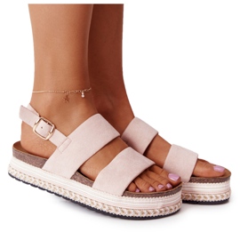 Sandaler i mocka på den rosa Olimpia -plattformen