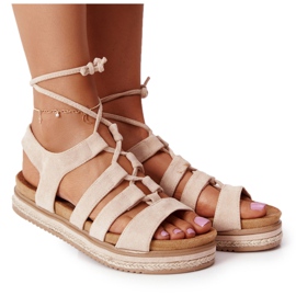 Knutna sandaler på en Beige Santorini -plattform
