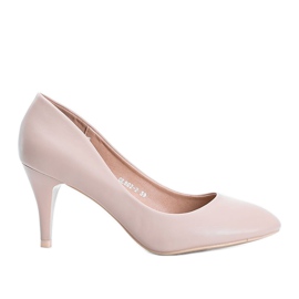 Beige pumps på en Dela -häl
