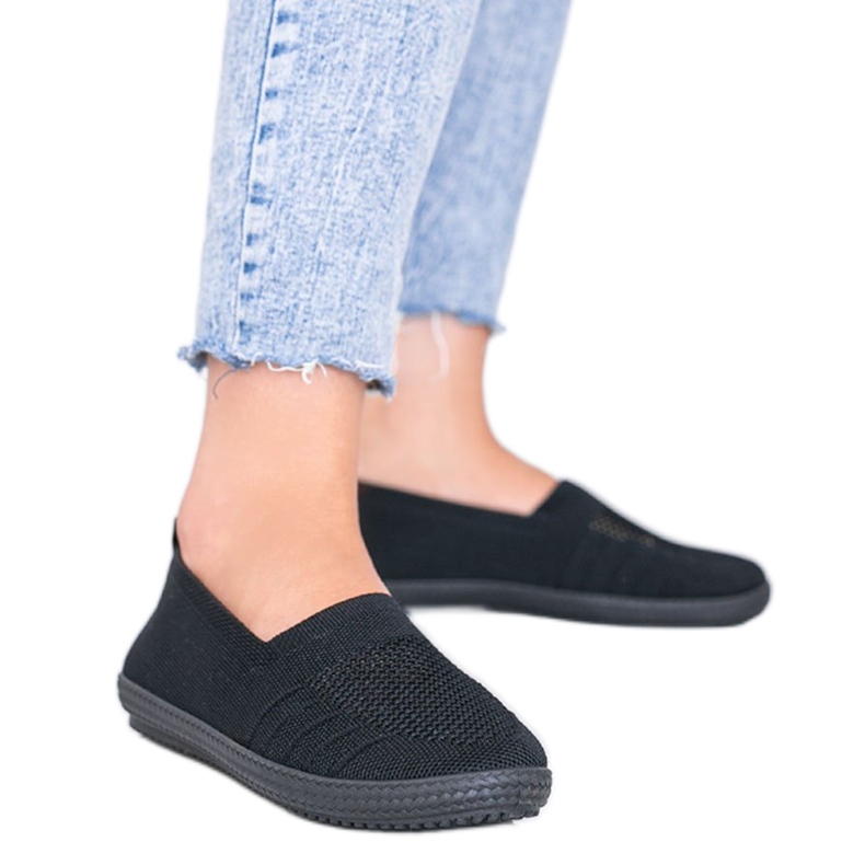 Djupsvarta öppen slip -on -sneakers