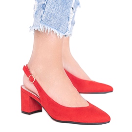 Röda pumpar på stolpen Petty