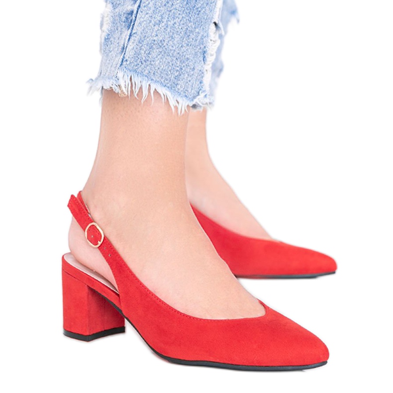 Röda pumpar på stolpen Petty