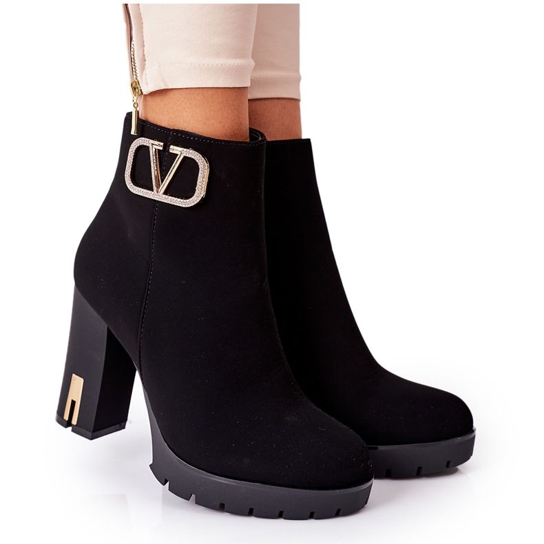 PS1 Svarta varma stövlar på en bar underbar gyllene