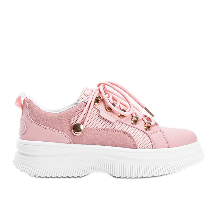 Rosa sneakers på en hög Tifel -sula