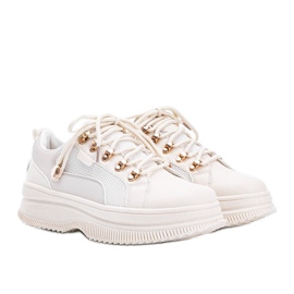 Beige sneakers med hög Tifel -sula
