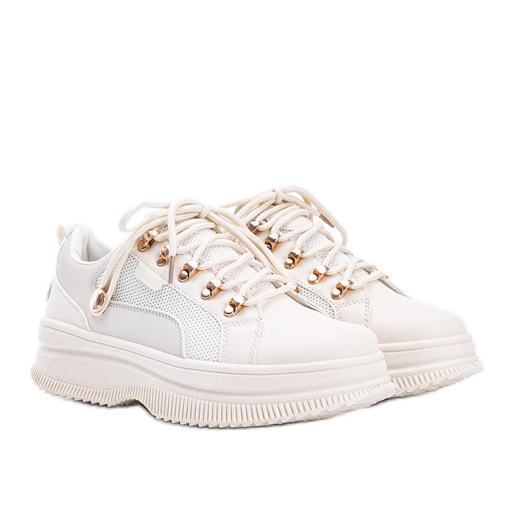 Beige sneakers med hög Tifel -sula