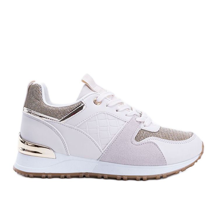 Beige sneakers med gyllene Yoisya -tillbehör
