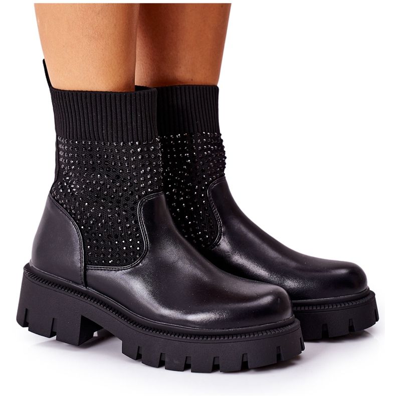 Svarta Xoxo -arbetare gjorda av flexibelt tyg med kubisk zirkoniumoxid