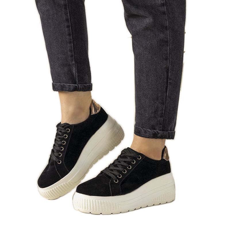 Svarta sportskor med hög Rapter -sula