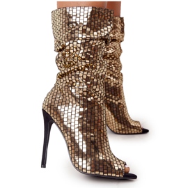 LU BOO Stövlar på en högklackad guldkväll gyllene