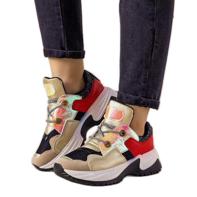 Guldsneakers med hög vårsula svart