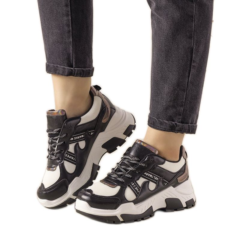 Svarta sneakers med holografiska Allison -insatser