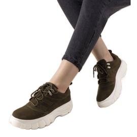 Gröna sportskor med hög Justika -sula