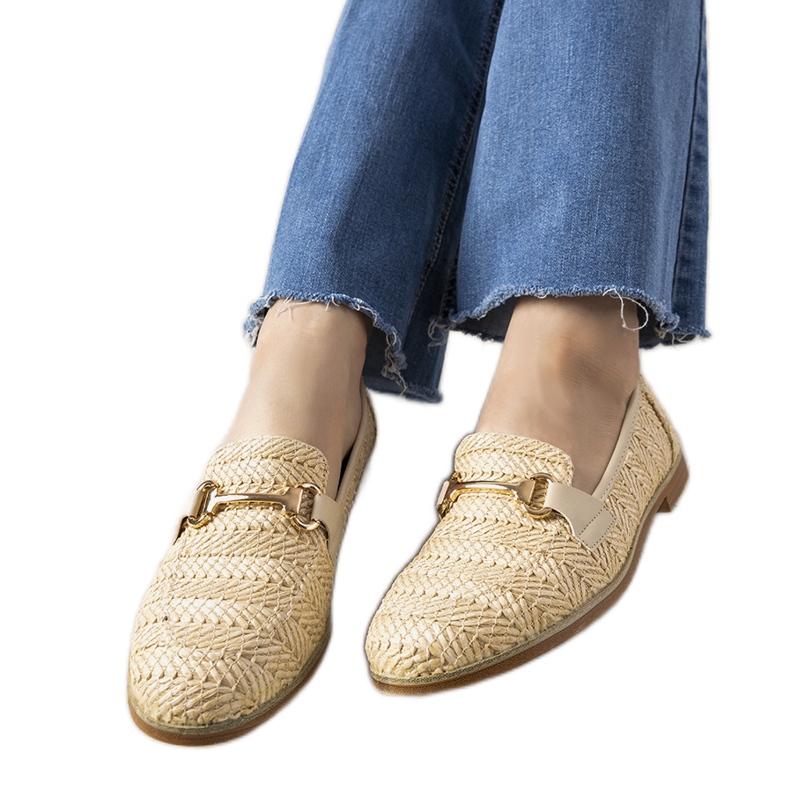 Beige flätade loafers med ett Leone -spänne
