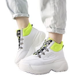 Vita sneakers på en hög Eloquence -sula