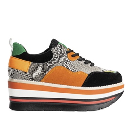 Svarta sneakers på en snygg sula orange grå