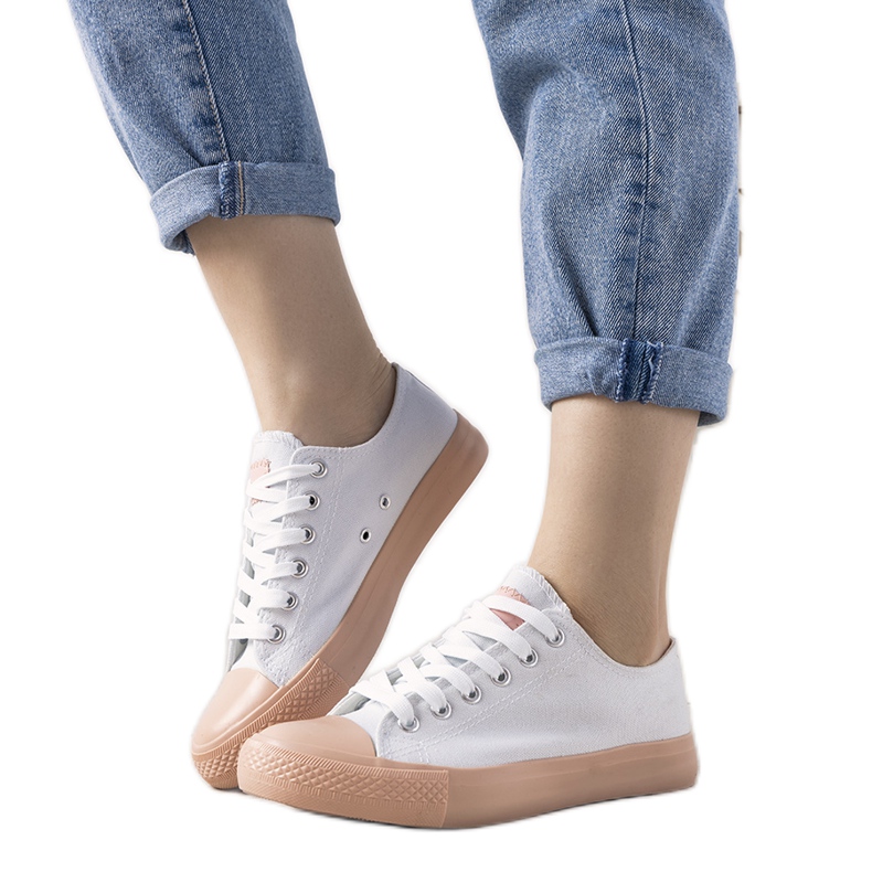 Senors vita och rosa sneakers för kvinnor