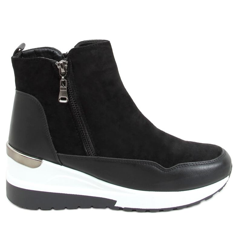 Svarta NB511 Svarta stövlar på en sportsula