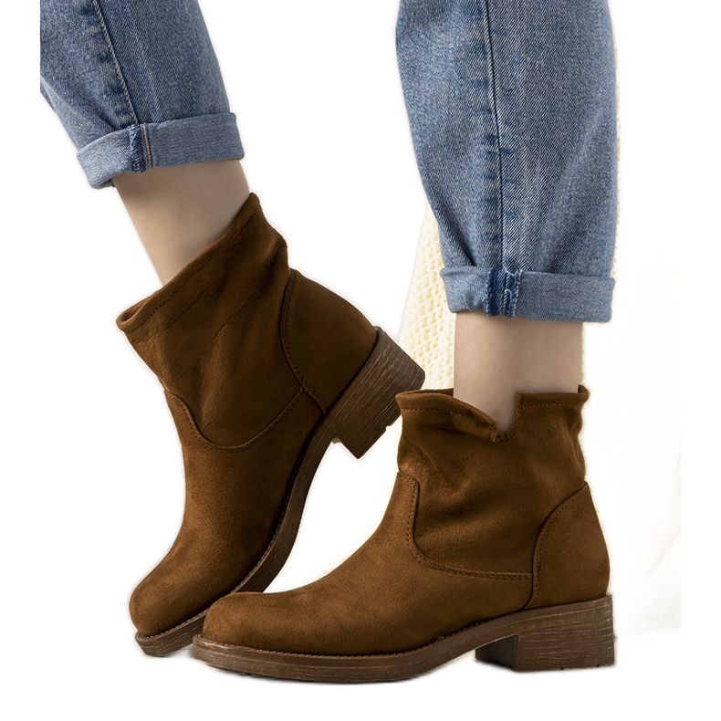 Roquelina bruna slip-on stövlar för kvinnor