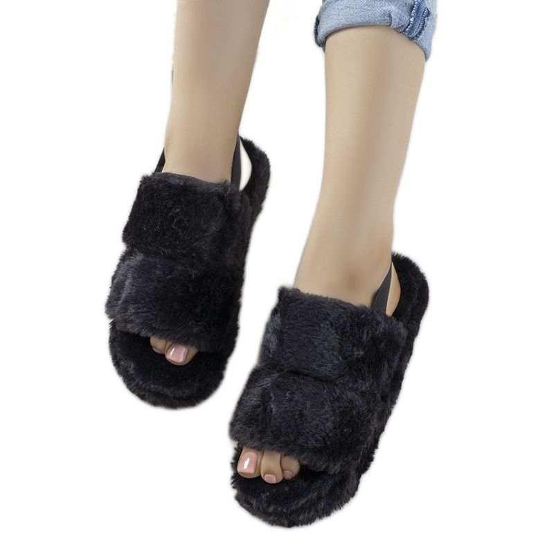 Svarta tofflor för damer med ett elastiskt band och Rosales pälskant