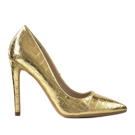 Gyllene pumps på en Thrower stilettklack