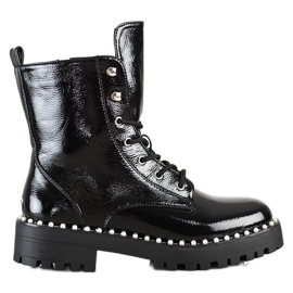 Bestelle Svarta arbetare med pärlor