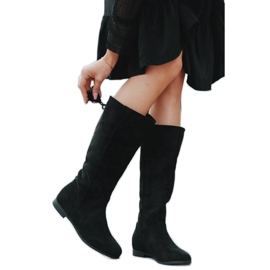 Svarta stövlar på Lean's kilklack