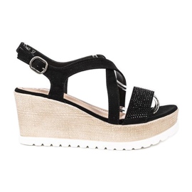 Svarta kilsandaler från Sadie