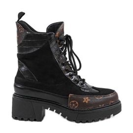 Svarta väskor med bruna skär