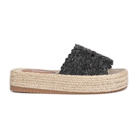 Svarta tofflor på plattformen Sudden Draft