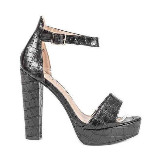 Svarta sandaler på Dolores -stolpen