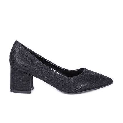 Svarta glödande pumpar på Laitas stolpe